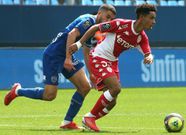 Monaco's Sofiane Diop escaping Oualid El Hajjam of Troyes