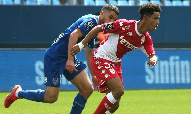 Monaco's Sofiane Diop escaping Oualid El Hajjam of Troyes