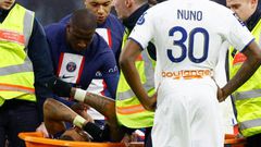 kimpembe-om-sur une civière