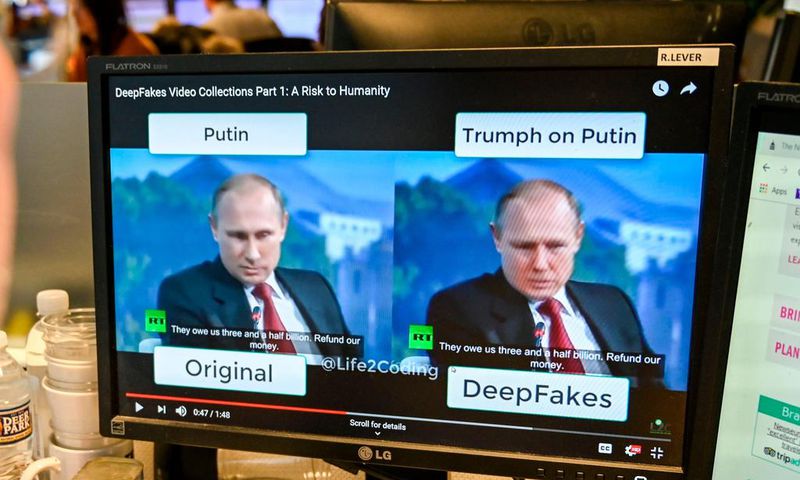 The FBI said on Tuesday that more people were using deepfake videos during job interviews. In this image, a person views a deepfake video on January 25, 2019, manipulated with artificial intelligence to potentially deceive viewers.