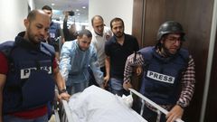 Evacuation de journaliste tué