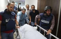 Evacuation de journaliste tué