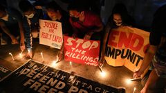 Manifestation à Quezon City, aux Philippines, après le meurtre du journaliste Percival Mabasa, le 4 octobre 2022. — © Aaron Favila/AP Photo/Keystone