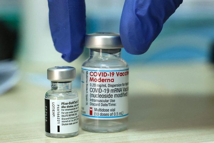 Vials of the Moderna and Pfizer COVID vaccines are seen above in Israel.