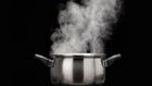 steam over cooking pot