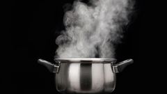 steam over cooking pot