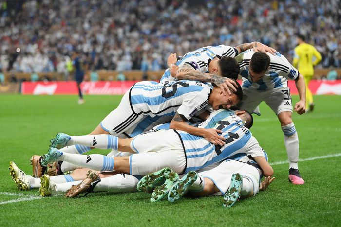 Messi's teammates piled on him when he scored Argentina's opener.Getty/Dan Mullan