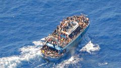 A undated photo provided by the Hellenic Coast Guard shows migrants onboard a boat before it capsized somehwere off the coast of Greece.Hellenic Coast Guard/Handout via Reuters