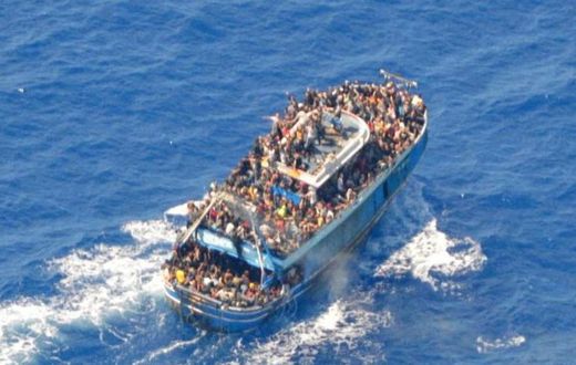 A undated photo provided by the Hellenic Coast Guard shows migrants onboard a boat before it capsized somehwere off the coast of Greece.Hellenic Coast Guard/Handout via Reuters