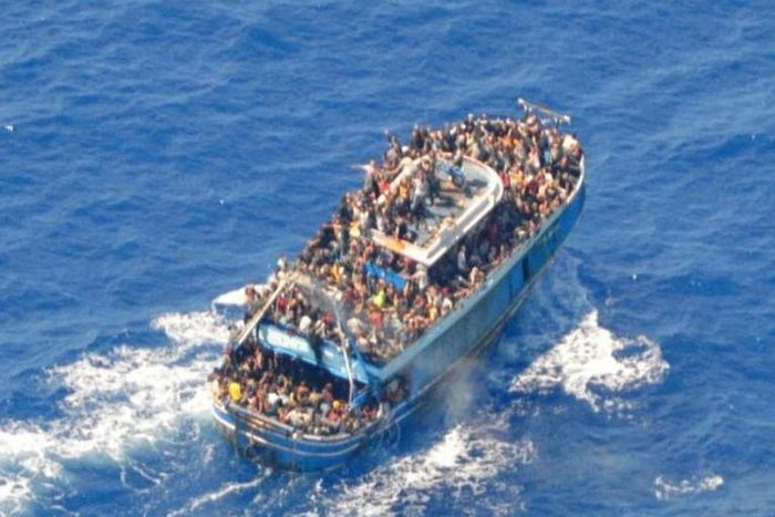 A undated photo provided by the Hellenic Coast Guard shows migrants onboard a boat before it capsized somehwere off the coast of Greece.Hellenic Coast Guard/Handout via Reuters
