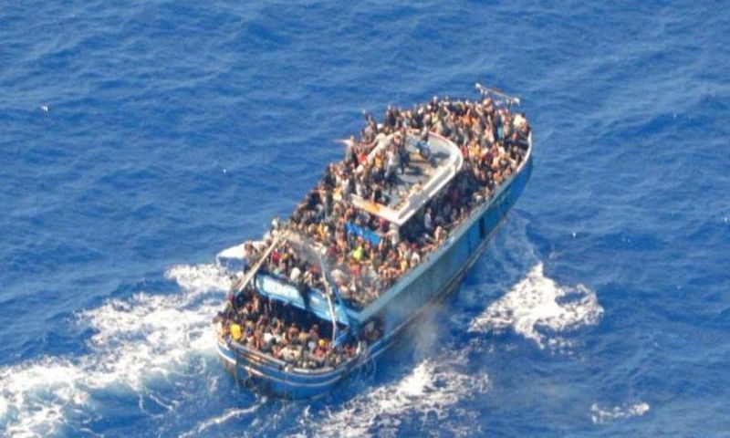 A undated photo provided by the Hellenic Coast Guard shows migrants onboard a boat before it capsized somehwere off the coast of Greece.Hellenic Coast Guard/Handout via Reuters