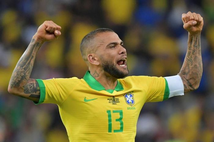 Captain Dani Alves celbrates after Brazil defeat Peru to win their ninth Copa America