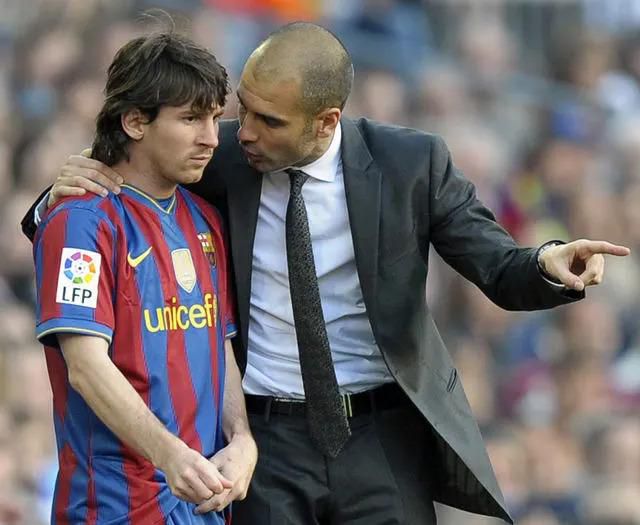 Guardiola et Messi au début de la carrière du joueur au FC Barcelone / AFP