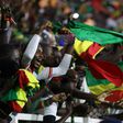 Senegal supporters at the Olembe Stadium celebrate their team's victory