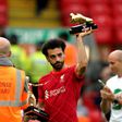 Salah holding up the Premier League golden boot award after the 3-1 win over Wolves