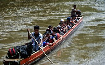 Migrants arrive at the Reception Center for Migrant Care in Lajas Blancas, in the jungle province of Darien, Panama, on June 28, 2024.MARTIN BERNETTI/AFP via Getty Images