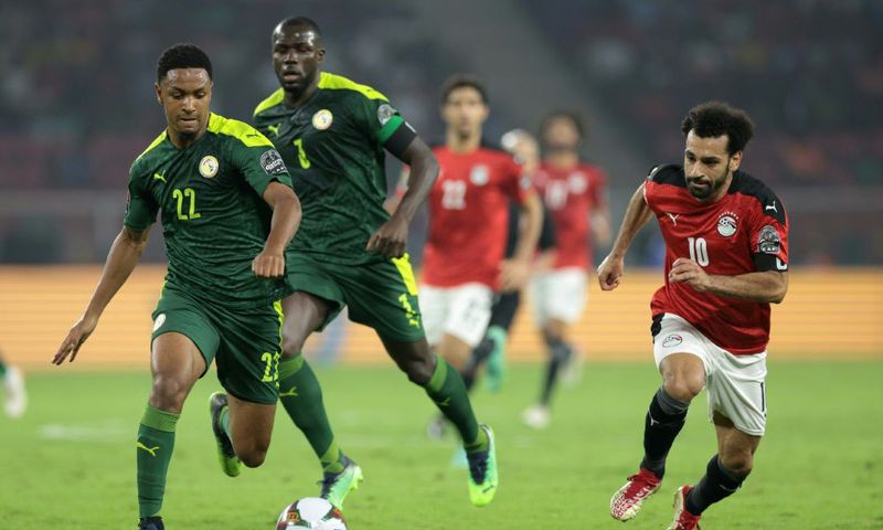 Egypt captain Mohamed Salah (R) chases after the ball during the Africa Cup of Nations final against Senegal in Yaounde on February 6.