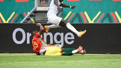 Senegal captain and forward Sadio Mane (R) evades a tackle by Guinea defender Issiaga Sylla during an Africa Cup of Nations Group B match in Bafoussam on Friday.