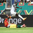 Senegal captain and forward Sadio Mane (R) evades a tackle by Guinea defender Issiaga Sylla during an Africa Cup of Nations Group B match in Bafoussam on Friday.