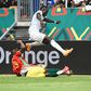 Senegal captain and forward Sadio Mane (R) evades a tackle by Guinea defender Issiaga Sylla during an Africa Cup of Nations Group B match in Bafoussam on Friday.