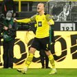 Erling Haaland celebrates scoring his second goal for Dortmund on Friday
