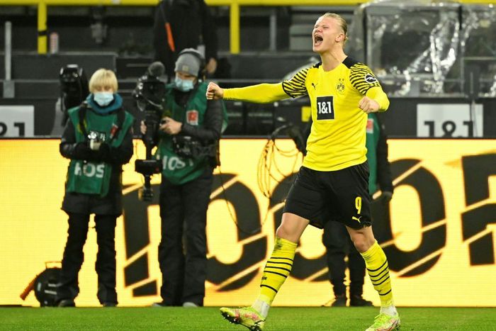 Erling Haaland celebrates scoring his second goal for Dortmund on Friday