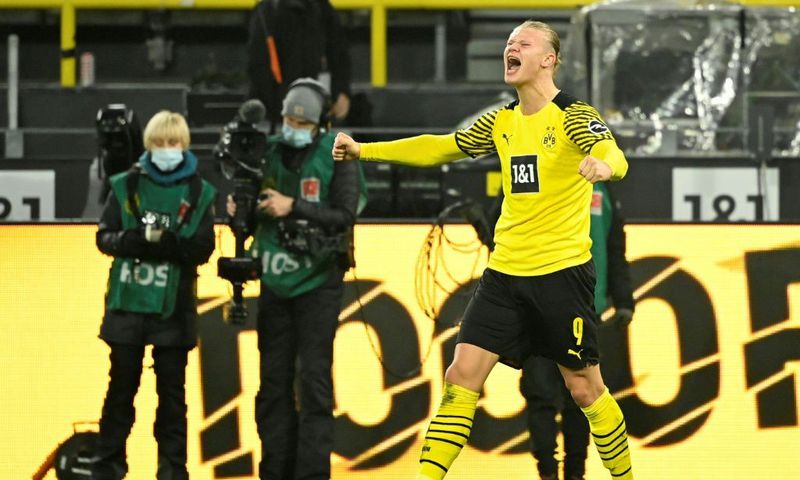 Erling Haaland celebrates scoring his second goal for Dortmund on Friday