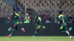 Famara Diedhiou celebrates wildly after scoring the opener against Equatorial Guinea.