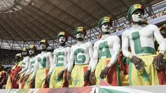 Senegal supporters are seen during the World Cup 2022 qualifying football match between Senegal and Egypt at the Me Abdoulaye Wade Stadium in Diamniadio on March 29, 2022. (Photo by SEYLLOU / AFP) (Photo by SEYLLOU/AFP via Getty Images)
