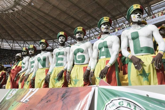 Senegal supporters are seen during the World Cup 2022 qualifying football match between Senegal and Egypt at the Me Abdoulaye Wade Stadium in Diamniadio on March 29, 2022. (Photo by SEYLLOU / AFP) (Photo by SEYLLOU/AFP via Getty Images)