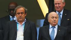 Sepp Blatter (R) and Michel Platini (L) in 2015, banned for 8 years by FIFA Ethics Committee following a corruption scandal.