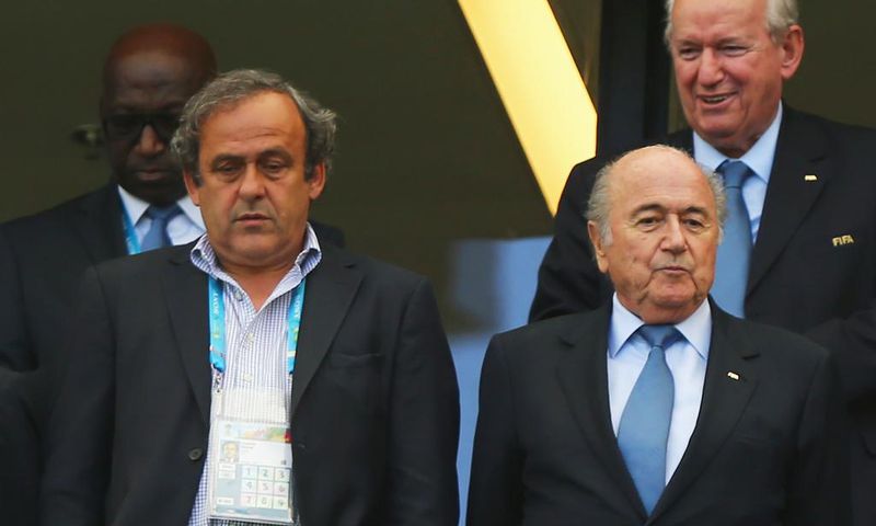 Sepp Blatter (R) and Michel Platini (L) in 2015, banned for 8 years by FIFA Ethics Committee following a corruption scandal.