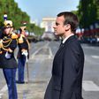 French President Emmanuel Macron stands at attention during the Bastille Day parade in Paris, July 14, 2017.