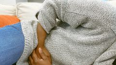 Abdominal pain is a common symptom of colon cancer.Getty Images