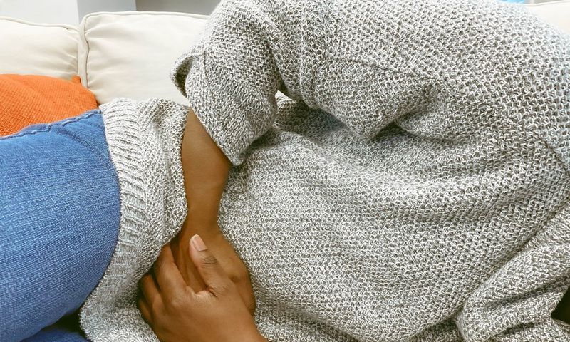 Abdominal pain is a common symptom of colon cancer.Getty Images