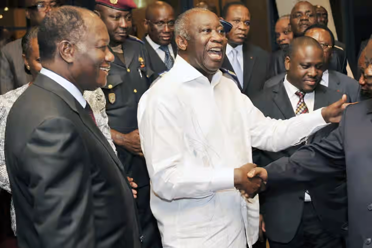 Alassane Ouattara posant avec Henri Konan Bédié et Laurent Gbagbo