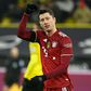 Robert Lewandowski scored twice for Bayern in a 3-2 win at Borussia Dortmund after finishing second to Lionel Messi in the Ballon d'Or voting