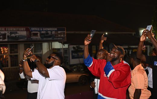As the clock struck midnight, revelers poured outside to witness a breathtaking fireworks display that lit up the industrial area sky.