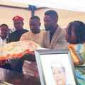 Bobi lays a wreath on the casket of Claire Choppa