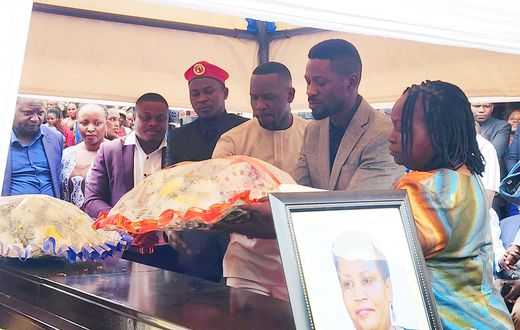 Bobi lays a wreath on the casket of Claire Choppa