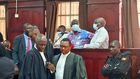 Besigye and Lutale in court on Wednesday (photo by Josephine Namakumbi)