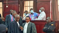Besigye and Lutale in court on Wednesday (photo by Josephine Namakumbi)