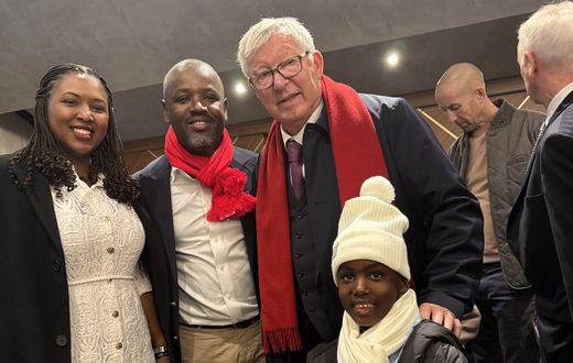 Speaker Thomas Tayebwa and his family pose with Sit Alex Ferfuson