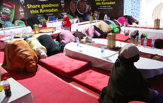 The Muslim community during prayers as they prepare to break the fast on Masjid Mosque Kawempe