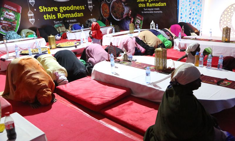 The Muslim community during prayers as they prepare to break the fast on Masjid Mosque Kawempe