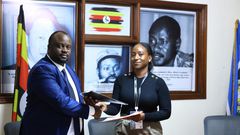 PACEID’s Matthew Bagonza and Masheda Foods Limited’s Sherina Nabakooza Ainembabzi after signing the MoU