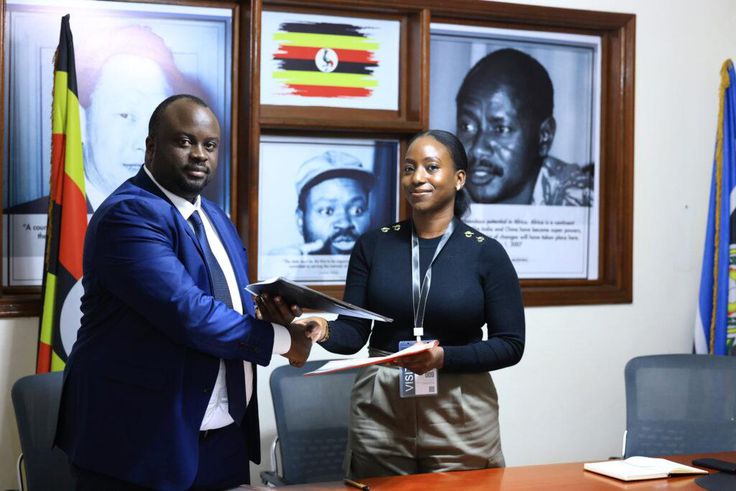 PACEID’s Matthew Bagonza and Masheda Foods Limited’s Sherina Nabakooza Ainembabzi after signing the MoU