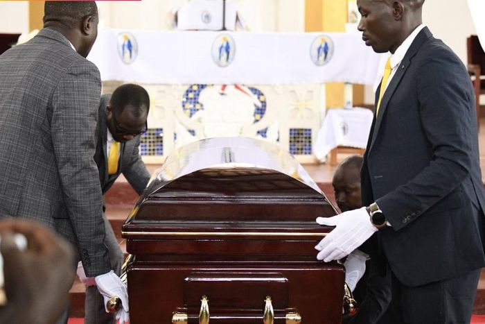The body of Joseph Tamale Mirundi at the requiem mass / courtesy
