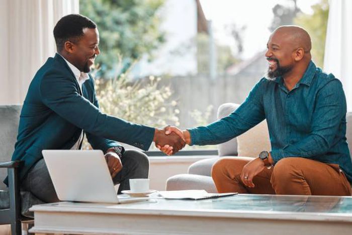 Body language is vital formaking good first impression [iStock]