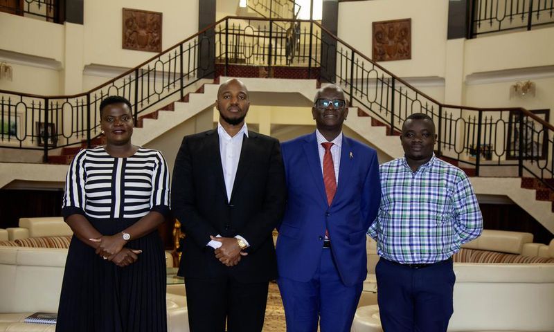 Matilda Babuleka  Marketing Manager Beer portfolio, Omukama of Tooro, Dr Oyo Nyimba Kabamba Iguru Rukidi 1V, Andrew Kilonzo the Managing Director of UBL and Edgar Kihumuro Brand Manager of Pilsner Lager